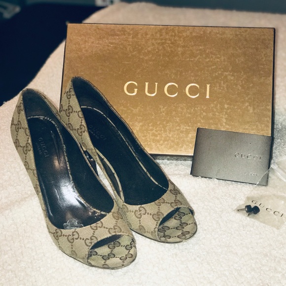 Gucci Shoes - Monogram Gucci peep toe pumps.